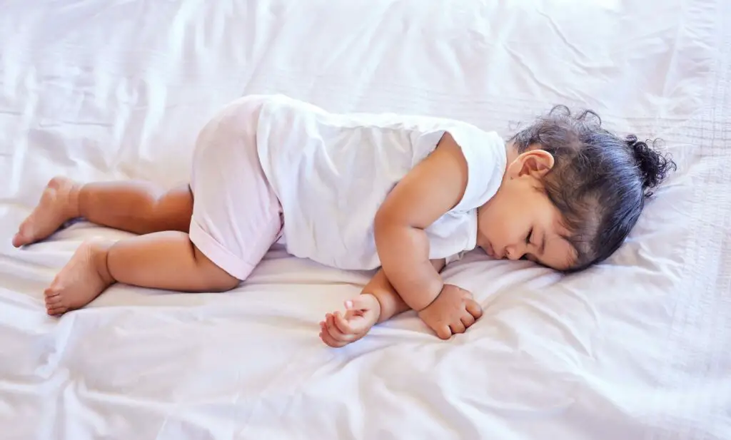 why do babies twitch in their sleep